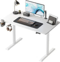 FEZIBO Height Adjustable Electric Standing Desk, 44 x 24 Inches Stand up Table, Sit Stand Home Office Desk with Splice Board, White